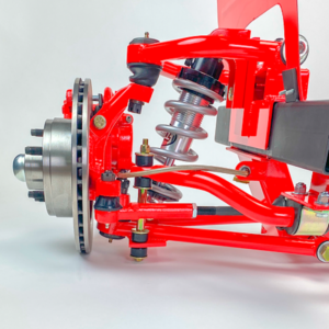 A red car suspension with the brake and wheel removed.